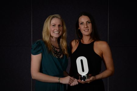 eporters Anthea Cannon and Erin Pearson with the newspaper’s award for Best Media Outle