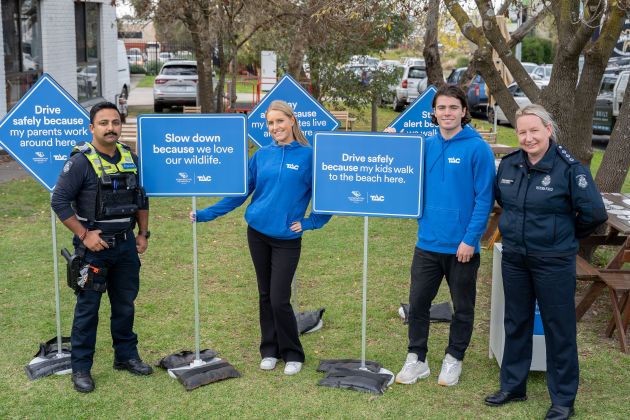 People standing with signs